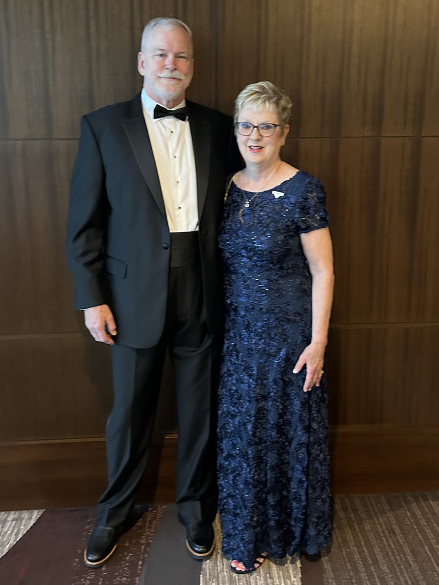 Portrait of Barry and Maggie Kulback in formalwear.